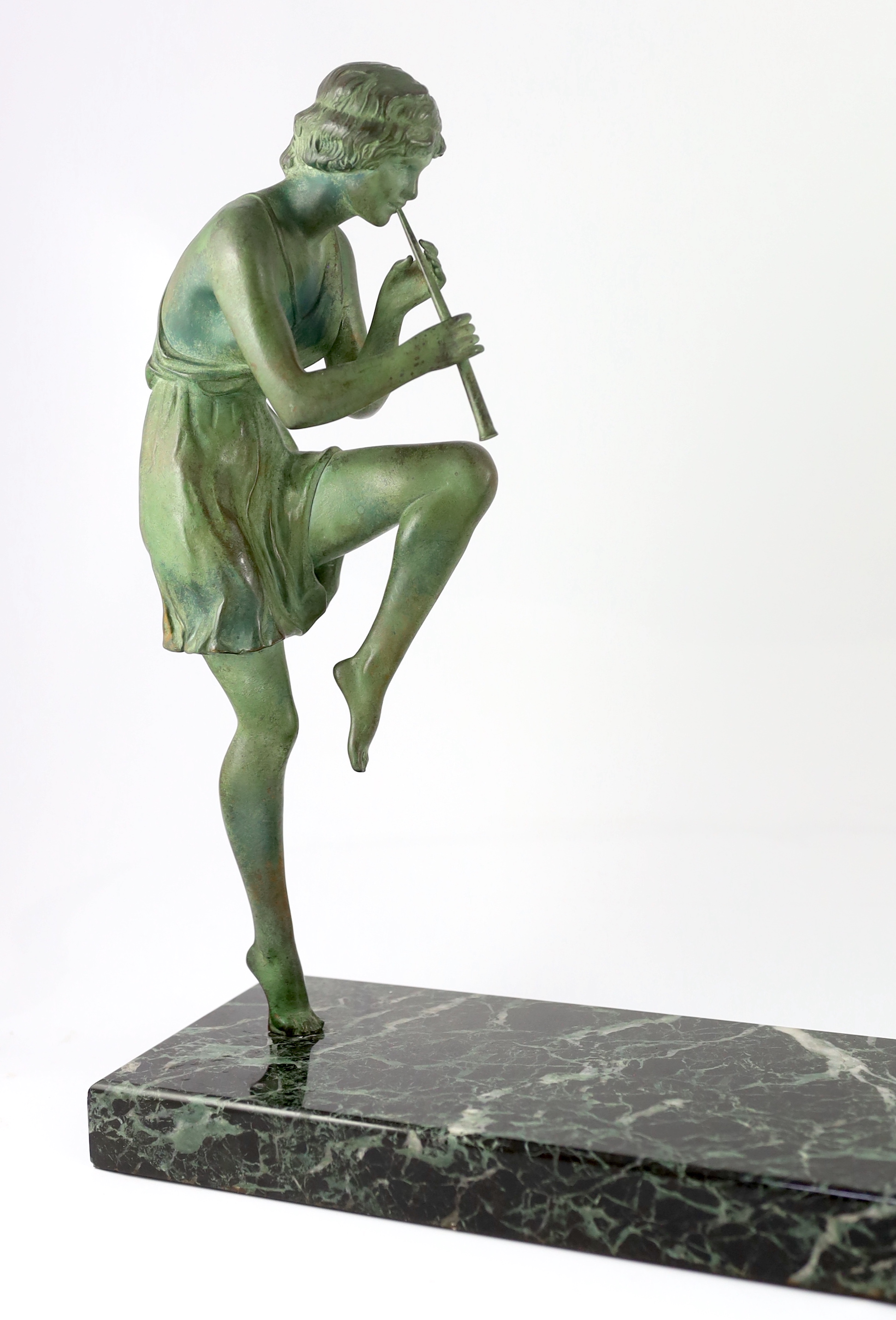 Philippe Matteau (Matto). An Art Deco bronze and marble group of three dancing pan pipers, 80cm wide, 15cm deep, 40cm high